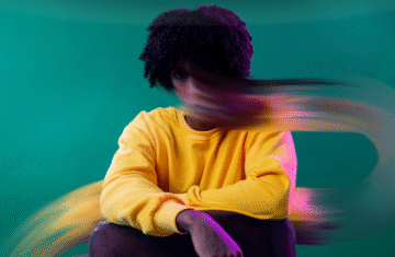 Aa person sitting in anxiety