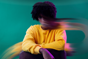 Aa person sitting in anxiety